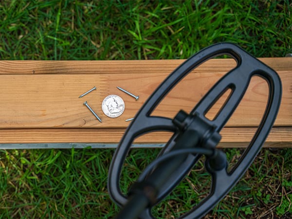 Detectorist hunting with a QUEST metal detector